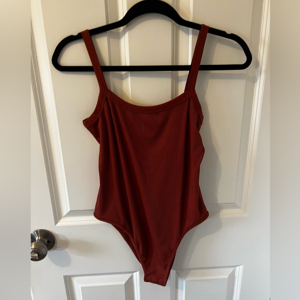 Amazon Brown Bodysuit Top with Minimalist Design - size large